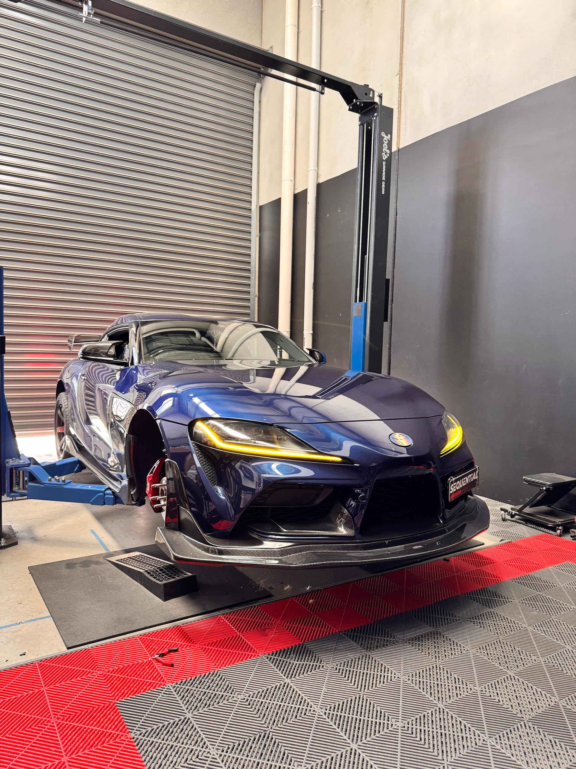 GR supra a90 a91 in downshift blue with the CSL style yellow front DRL