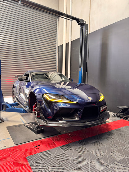 GR supra a90 a91 in downshift blue with the CSL style yellow front DRL